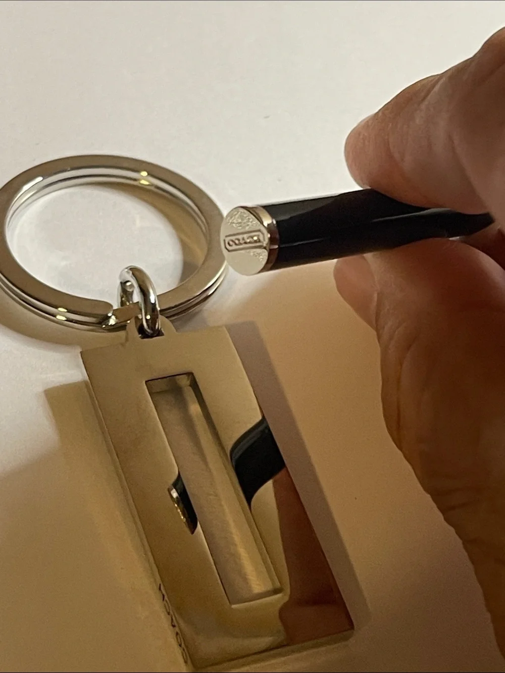 Coach Black and Silver Rectangular Keychain and Coach Pen